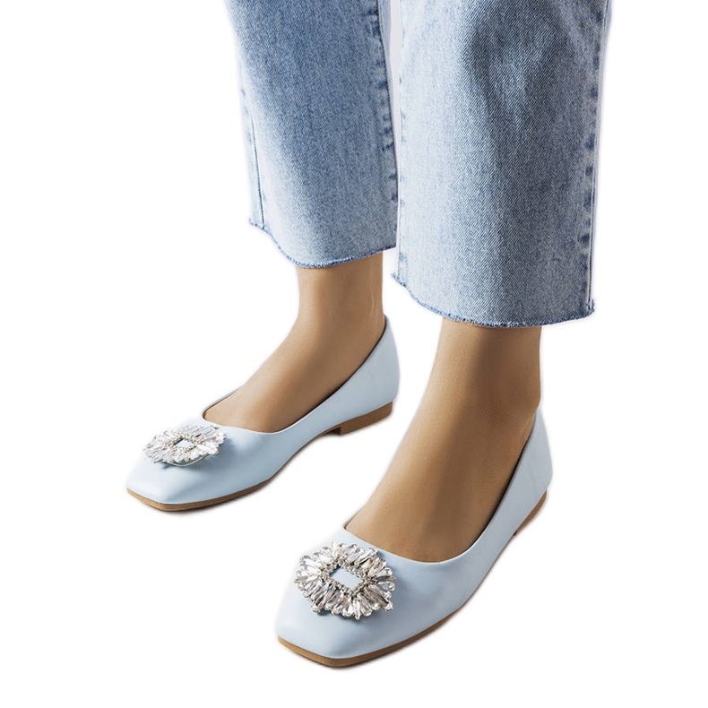 Blue ballerinas with a Miren brooch