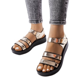 Gold lacquered Brices sandals golden