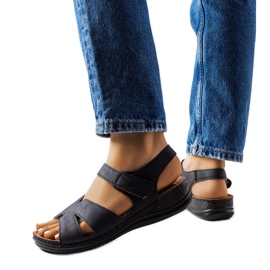 Black low wedge sandals from Nelly