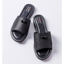 Black metallic sandals with pearls from Frederi