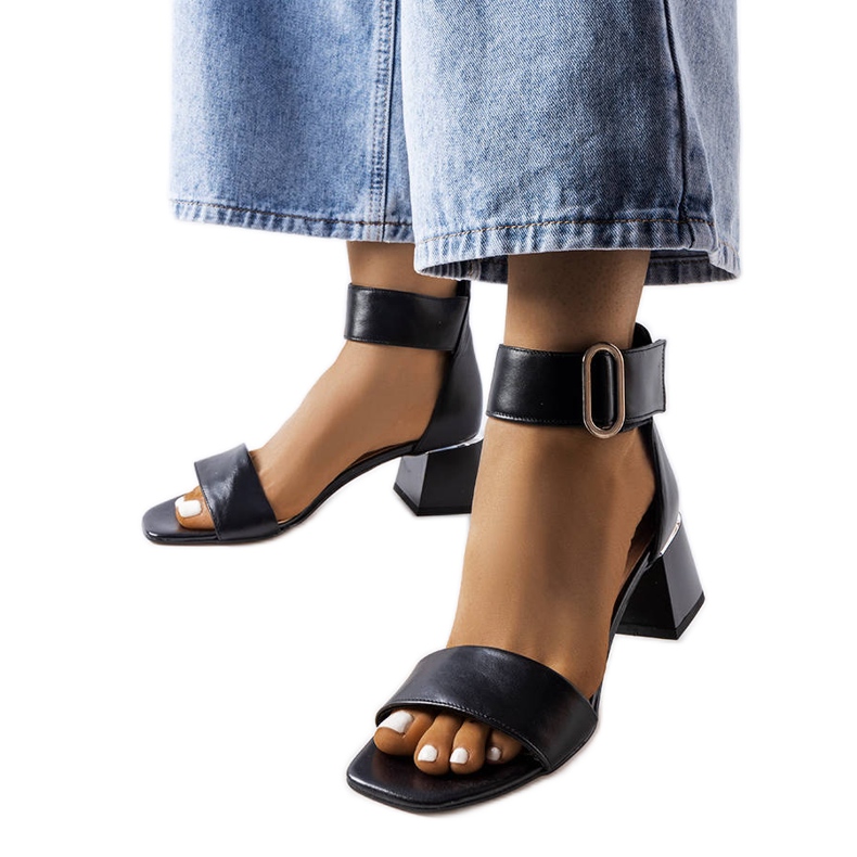 Black sandals on a low heel from Karino