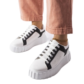 White sneakers on the Gosselin platform