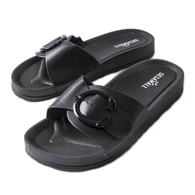 Black slides with a buckle from Généreux
