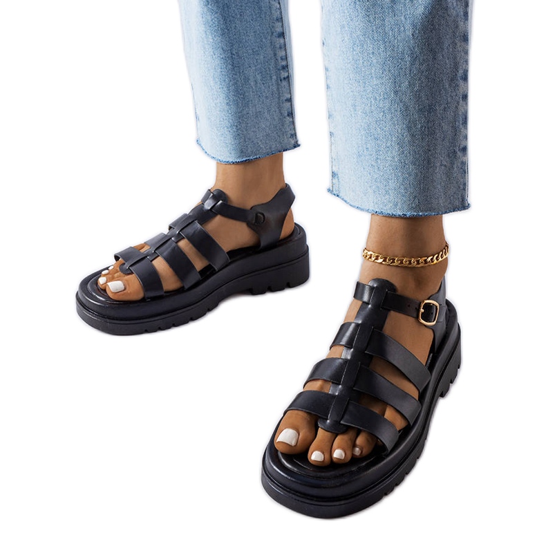 Black sandals with tract soles from Saidi