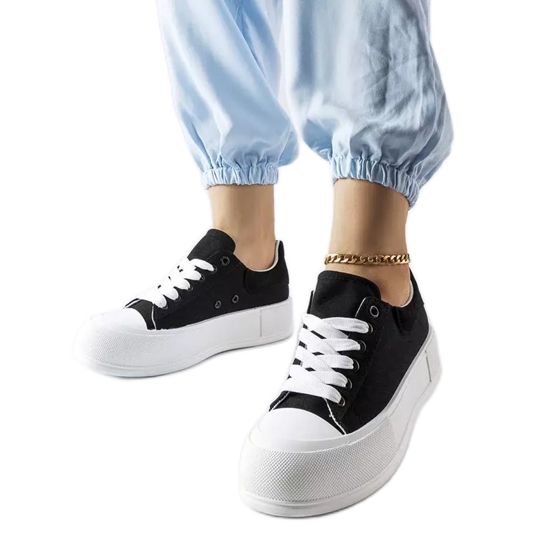 Black platform sneakers from Josseaume