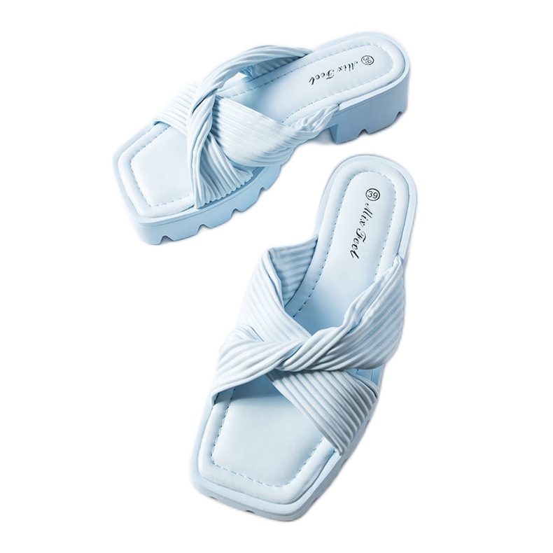Inna Dubé blue tractor sole sliders