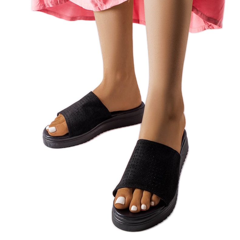 Black slides with an openwork upper from Idabel