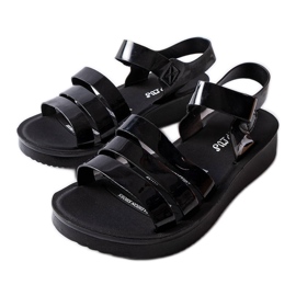 Black lacquered wedge sandals from Covillon
