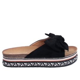 Delair Black high soles with a bow
