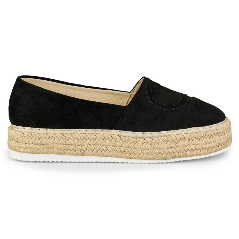 Black espadrilles on the platform