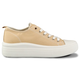 Beige sneakers on a low platform