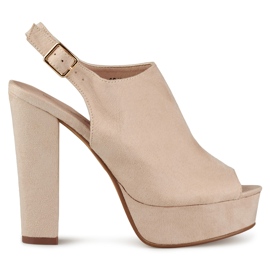 Beige high heel sandals with open toe and heel