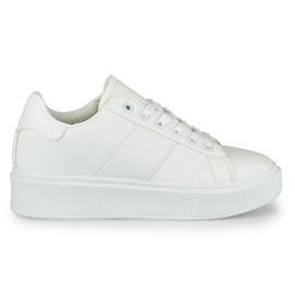 Women's white sneakers on the platform