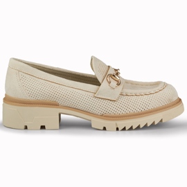 Openwork beige shoes with a delicate decoration