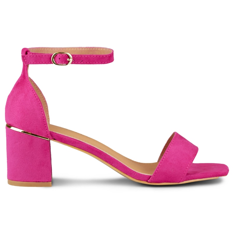Pink sandals on a low heel with a golden detail