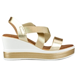 Comfortable wedge sandals with golden stripes