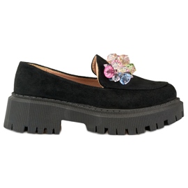 Black loafers with beads