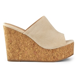 Beige flip flops on a cork wedge