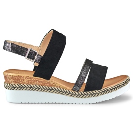 Ladies' black sandals on a low wedge