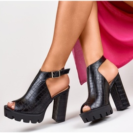 Ladies' black sandals on a high heel