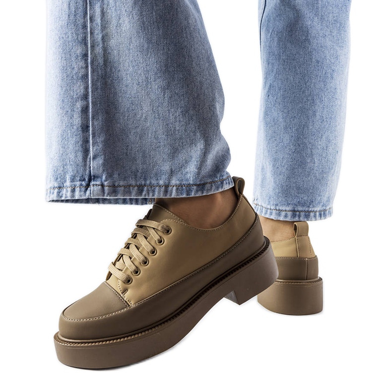 Brown flat shoes from Merico