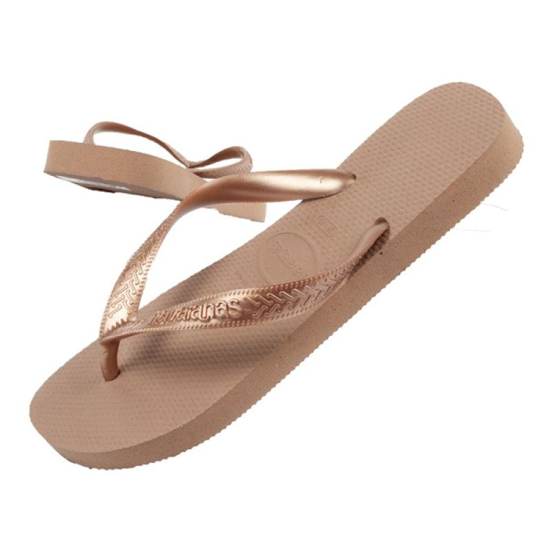 Gold havaianas top flip flops