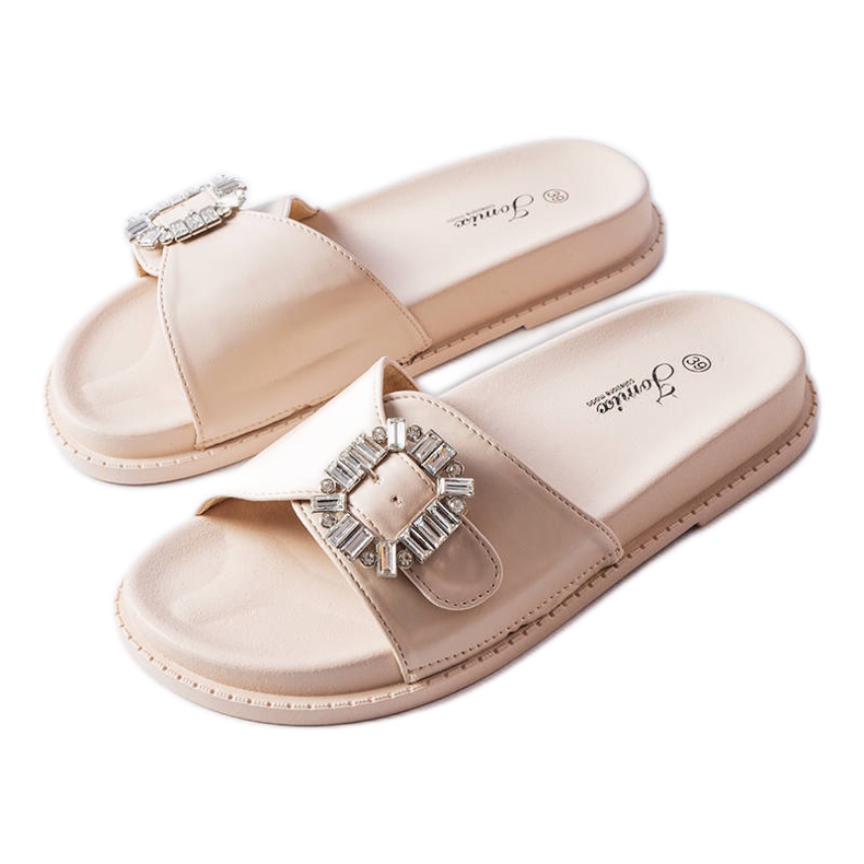 Beige slides decorated with rhinestones from Griegsvei