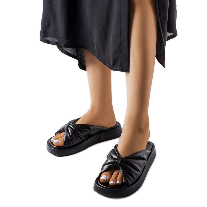 Black low wedge sandals from Hog