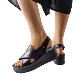 Black low wedge sandals from Adelina