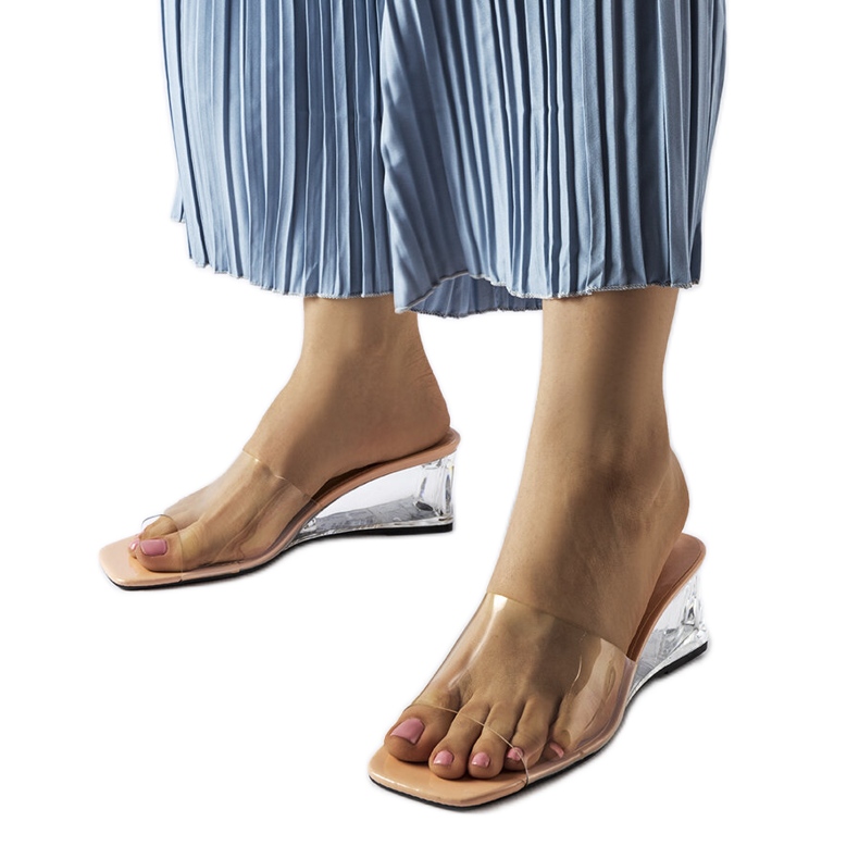 Beige transparent wedge slides from Wyatt