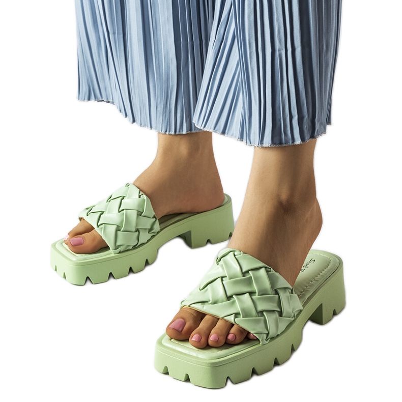 Green slides on the tractor sole from Lora