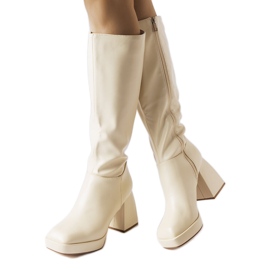 Beige boots on a massive post from Villanova Beige boots on a massive post from Villanova