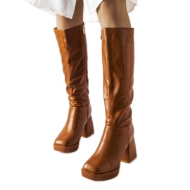 Brown boots with a massive post from Villanova Brown boots with a massive post from Villanova