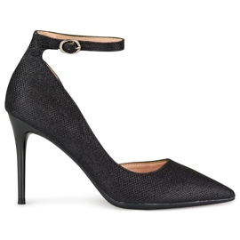 Shiny black pins fastened on the ankle