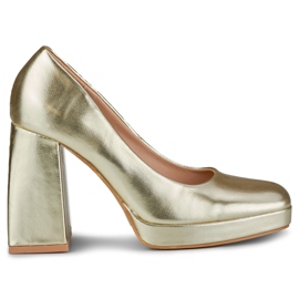 Gold pumps on a wide high heel golden