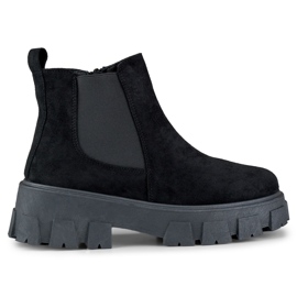Women's black boots with a thick sole