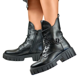 Women's rock boots with a decorative buckle black