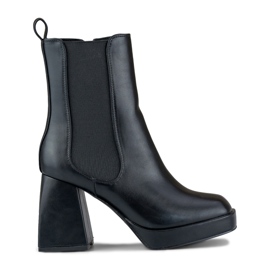 Women's black boots on a high heel