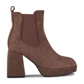 Women's suede brown boots on a high heel