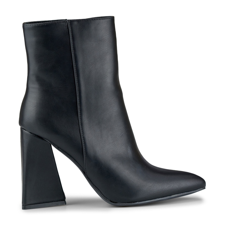 Black boots on a triangle-shaped post