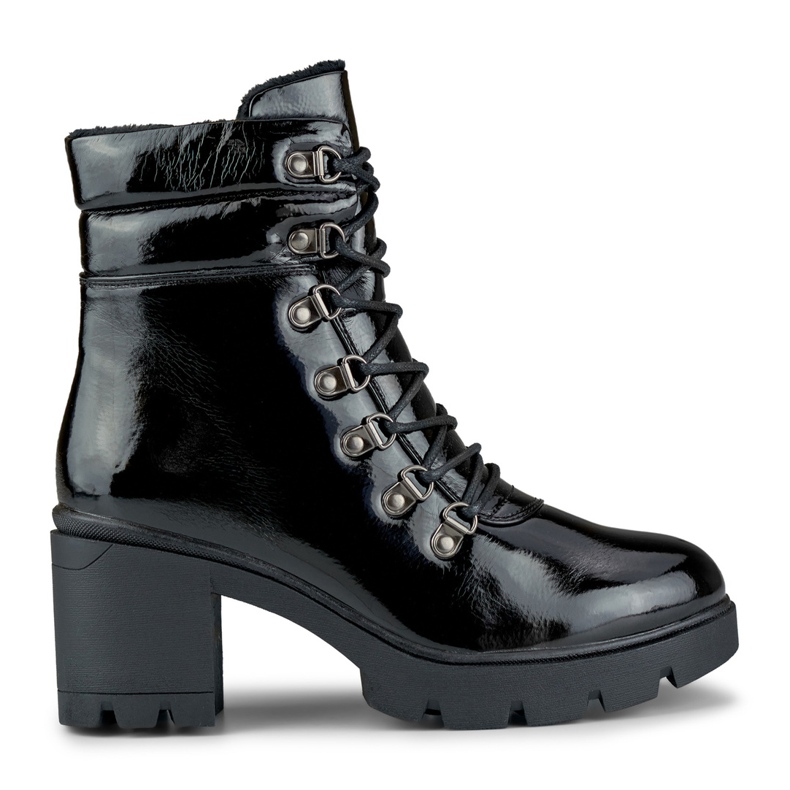 Lacquered black women's boots on the post