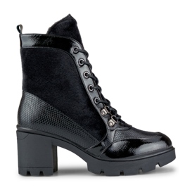 Fashionable women's boots made of decorative material black