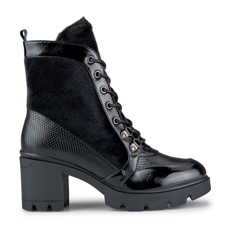 Fashionable women's boots made of decorative material black