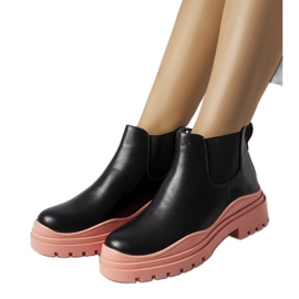 Black ankle boots on a colorful Marinone platform Black ankle boots on a colorful Marinone platform