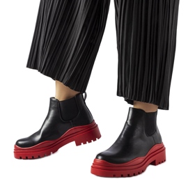 Black ankle boots on a colorful Marinone platform Black ankle boots on a colorful Marinone platform