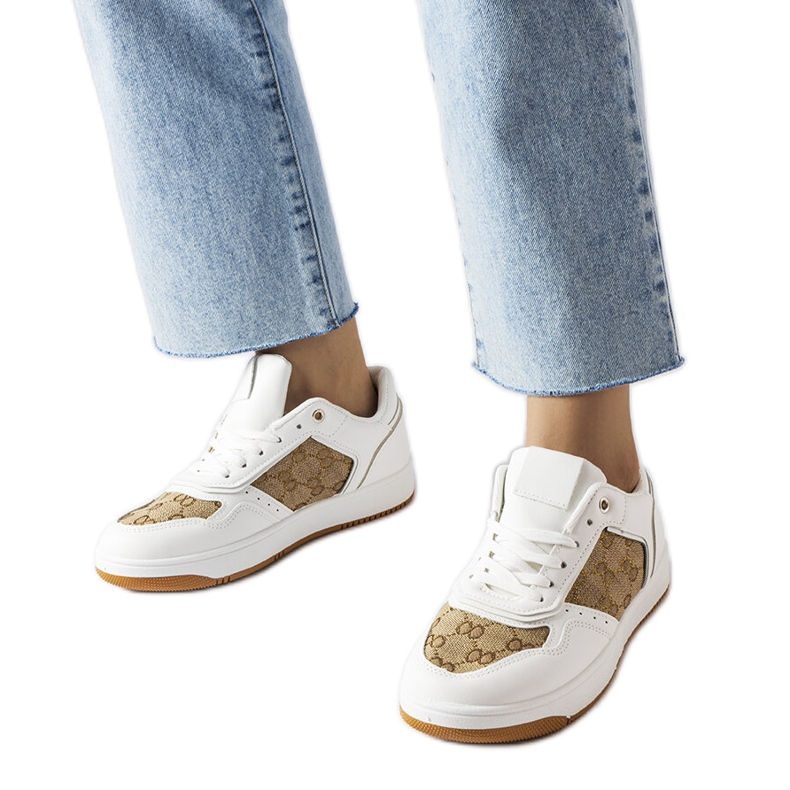 Inna White sneakers decorated with the Isidor monogram Inna White sneakers decorated with the Isidor monogram