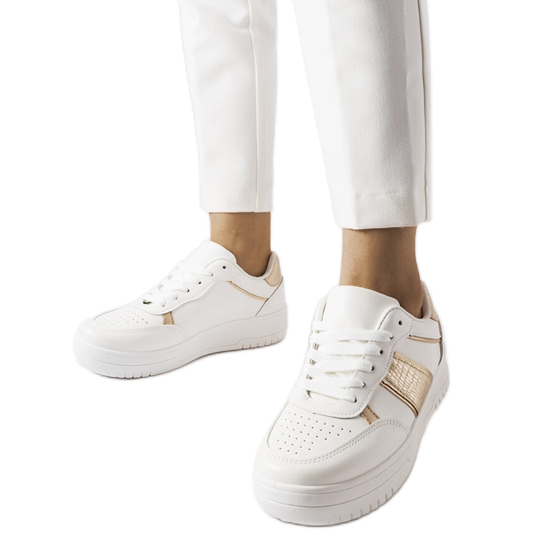 White and gold sports sneakers from Parma