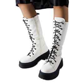 White insulated boots on the Hide platform White insulated boots on the Hide platform