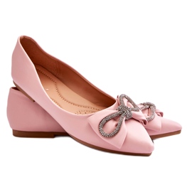 Elegant ballerina shoes with a bow and pink rhinestones