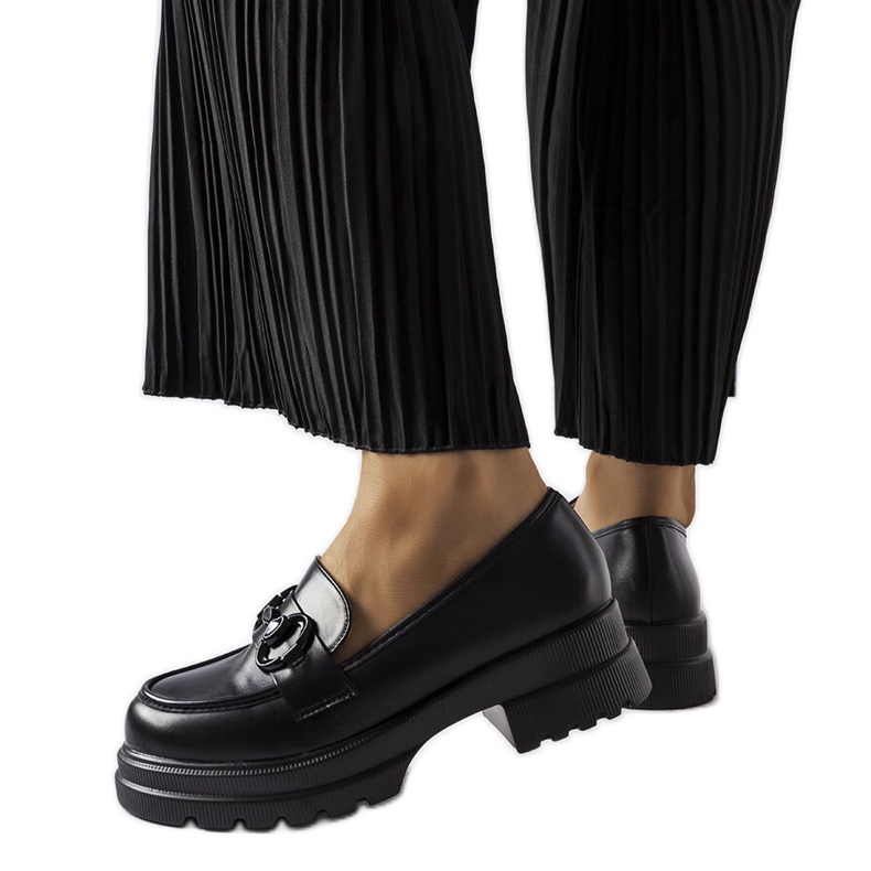 Black moccasins with a black buckle from Morubio